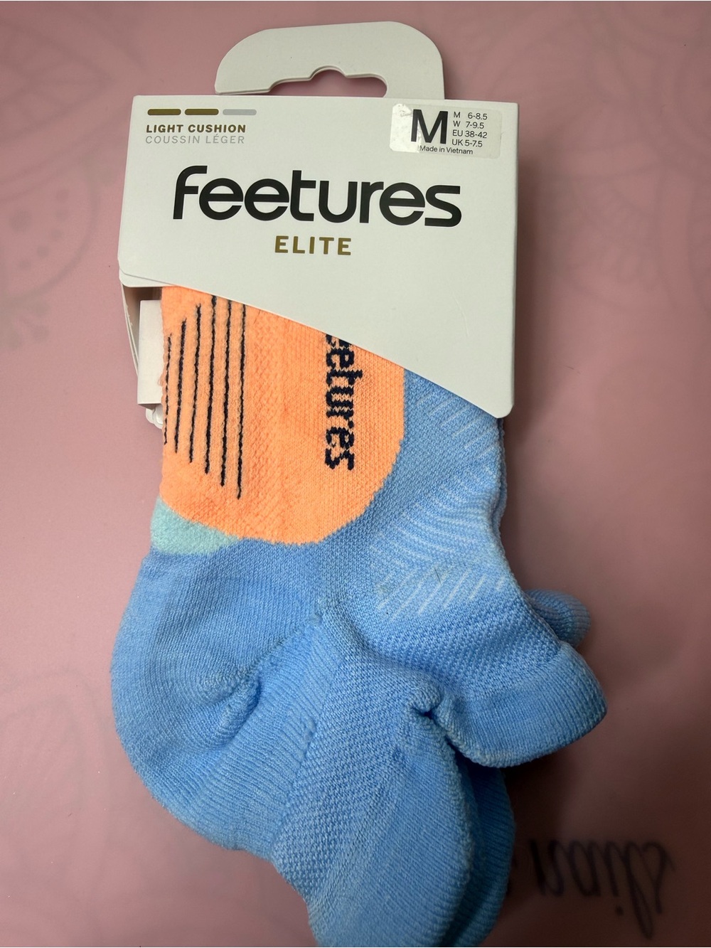 Feetures Elite Women’s Light Blue Athletic Low-Cut Socks with Peach Accent